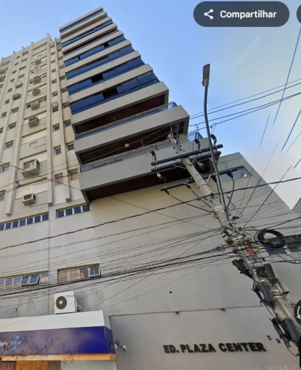 LOTE 007 - NOVO HAMBURGO - O apartamento nº 601 do Edifício Plaza Center, sob o nº. 392 da Rua Lima e Silva, situado na área urbana no bairro Centro,