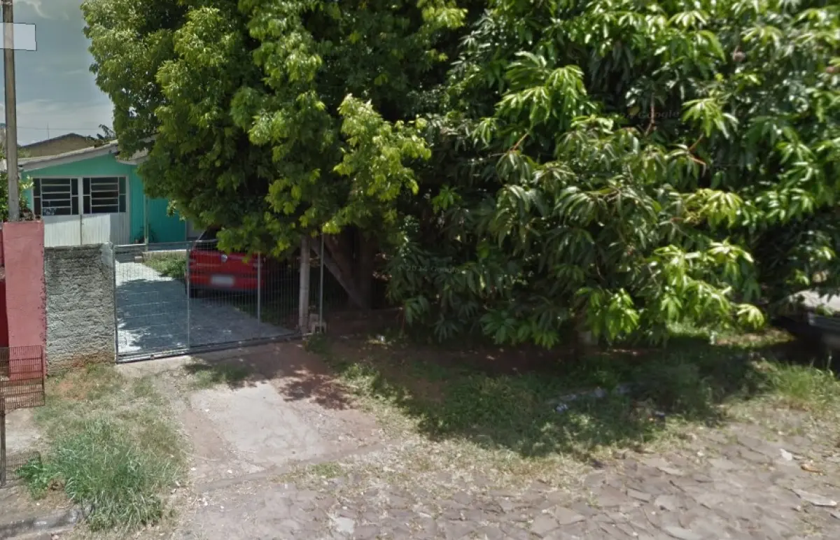 LOTE 041 - Um terreno urbano com edificação em alvenaria e em madeira, situado na Rua Limoeiro, sob numeração 68, no município de Portão/RS