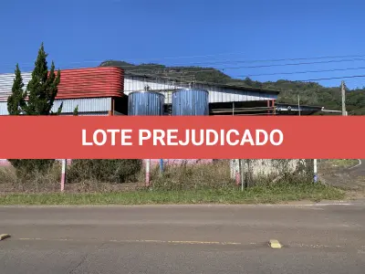 LOTE 001 - Imóvel e maquinas para laticínio