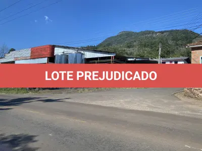 LOTE 001 - Imóvel e maquinas para laticínio