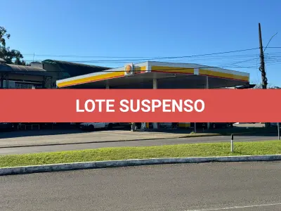 LOTE 002 - Prédio Comercial em alvenaria - shopping de lojas e posto combustivel