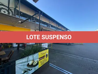 LOTE 002 - Prédio Comercial em alvenaria - shopping de lojas e posto combustivel