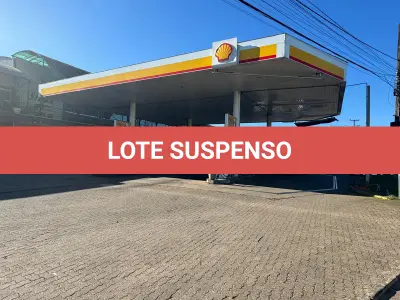 LOTE 002 - Prédio Comercial em alvenaria - shopping de lojas e posto combustivel