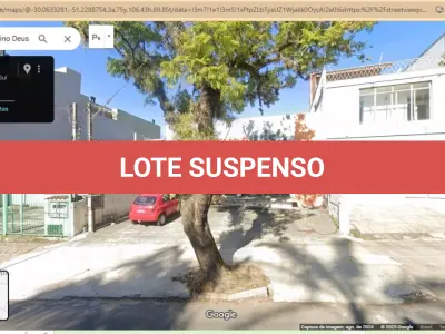 LOTE 000 - O prédio de alvenaria, localizado na Rua Silveiro, nº 372, Bairro Menino Deus, e o respectivo terreno de forma retangular, medindo 49,50m de frente a fundo, com 11,00m