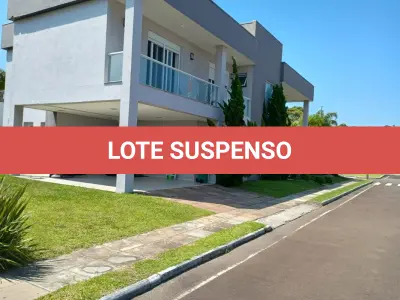 LOTE 000 - O imóvel na Avenida Interbalneários nº 436, lote 1L, situado no Condomínio Horizontal de Lotes Porto Coronado, localizado na Praia de Atlântida, município de Xangri-lá, constituído do lote 1L, da quadra L, com área superficial privativa de 450m2