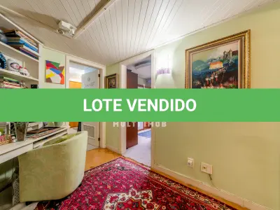 LOTE 000 - O apartamento nº 601 no Ed. Maison Paris, na Rua Pedro Ivo nº 532. O espaço de estacionamento coberto nº 01. O espaço de estacionamento coberto nº 02