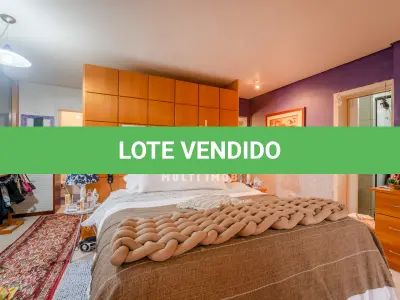 LOTE 000 - O apartamento nº 601 no Ed. Maison Paris, na Rua Pedro Ivo nº 532. O espaço de estacionamento coberto nº 01. O espaço de estacionamento coberto nº 02