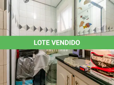 LOTE 000 - O apartamento nº 601 no Ed. Maison Paris, na Rua Pedro Ivo nº 532. O espaço de estacionamento coberto nº 01. O espaço de estacionamento coberto nº 02