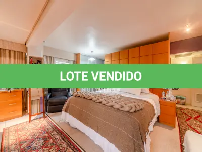 LOTE 000 - O apartamento nº 601 no Ed. Maison Paris, na Rua Pedro Ivo nº 532. O espaço de estacionamento coberto nº 01. O espaço de estacionamento coberto nº 02