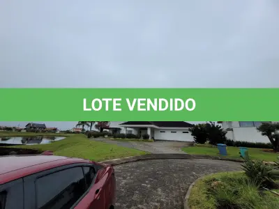 LOTE 001 - Terreno de 1.811m² e casa com 697,74m² de área construída