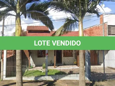 LOTE 008 - NOVO HAMBURGO - O terreno com um prédio residencial em alvenaria de padrão simples, sob o n.º 353 da Rua dos Eucaliptos, situado no bairro Ideal