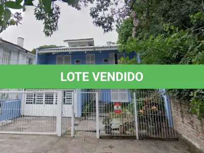 LOTE 001 - A casa sob o nº 240 da Rua Camerino