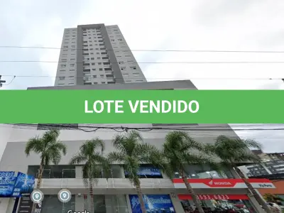 LOTE 020 - Um apartamento sob a numeração de 1202 e Box 416, no Condomínio Start Residence. Situado no bairro Centro, na Av. Primeiro de Março nº 733.