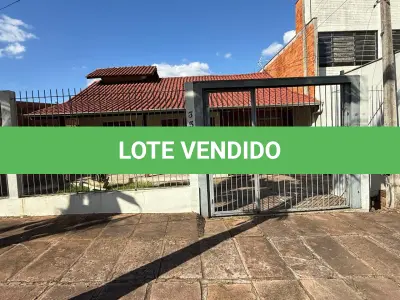 LOTE 008 - NOVO HAMBURGO - O terreno com um prédio residencial em alvenaria de padrão simples, sob o n.º 353 da Rua dos Eucaliptos, situado no bairro Ideal