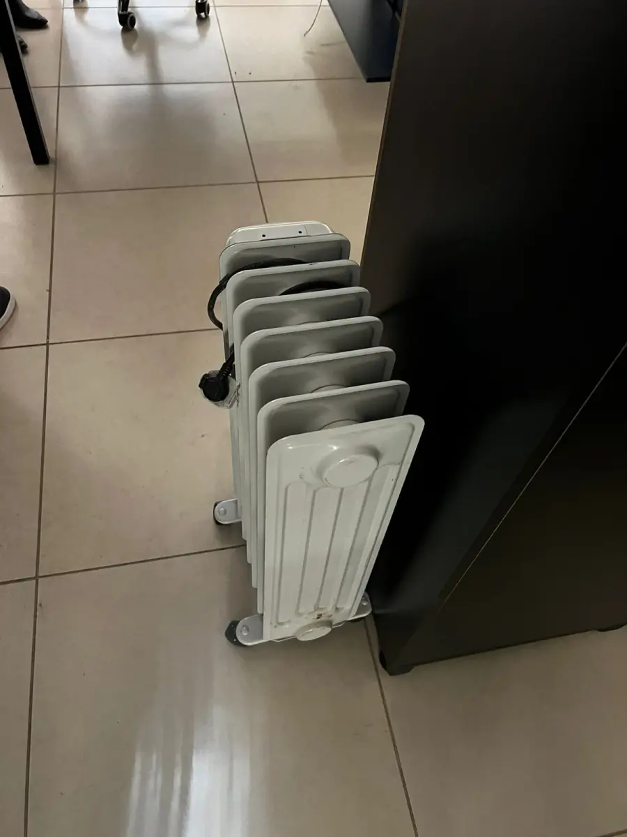 LOTE 119 - Aquecedor a óleo 