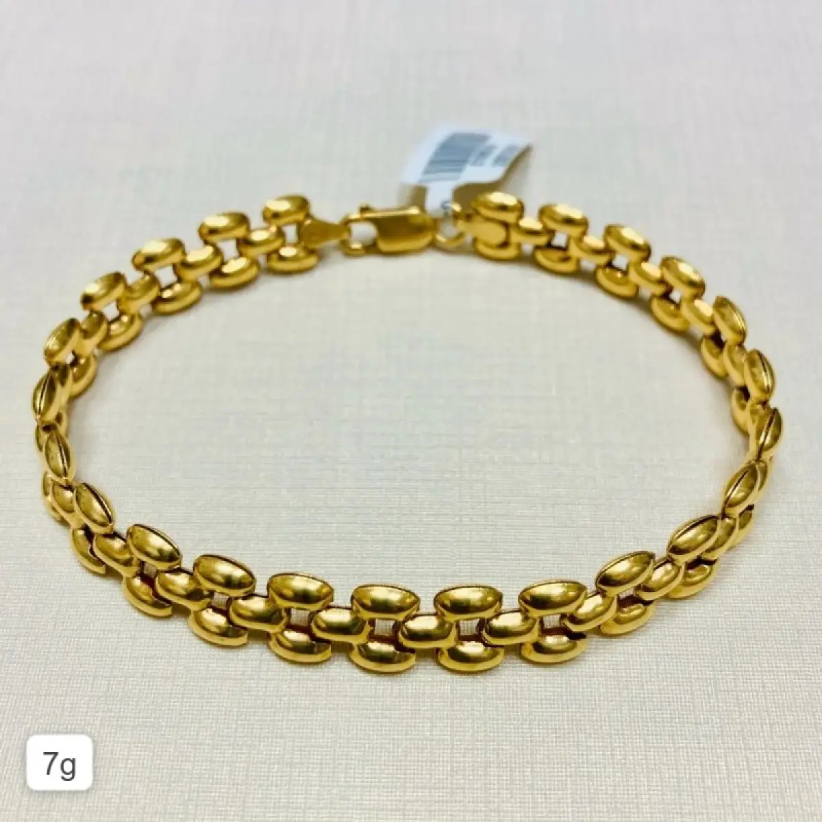 LOTE 005 - Pulseira: Modelo Elo Pingos. Com 18cm de comprimento e 8mm de largura. Ouro 18k. Código: 186368