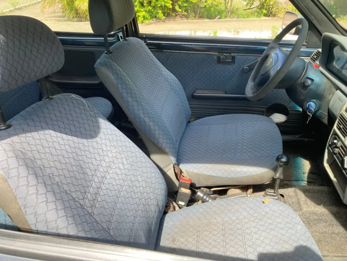 LOTE 034 - Fiat Uno Mille Fire, fabricação/modelo 2002/2003, cor azul