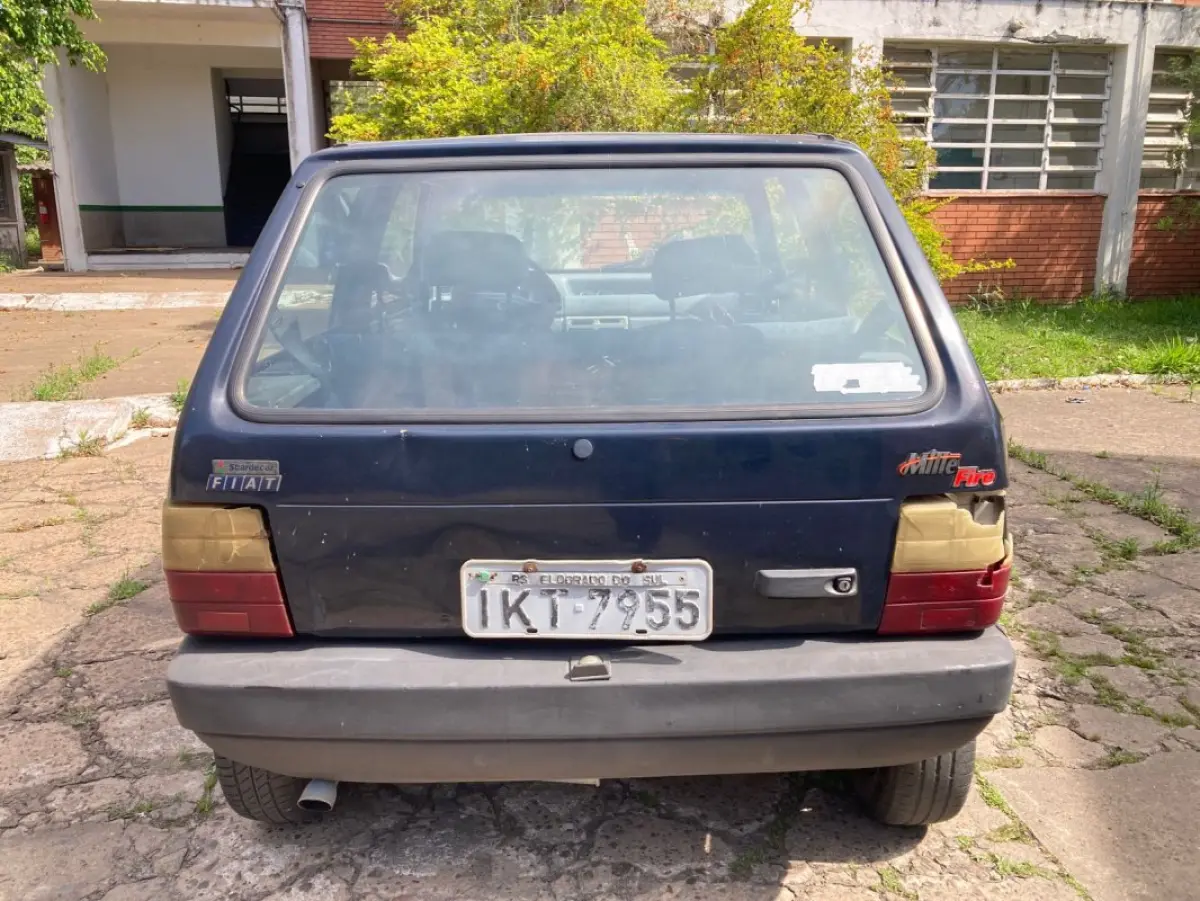 LOTE 034 - Fiat Uno Mille Fire, fabricação/modelo 2002/2003, cor azul