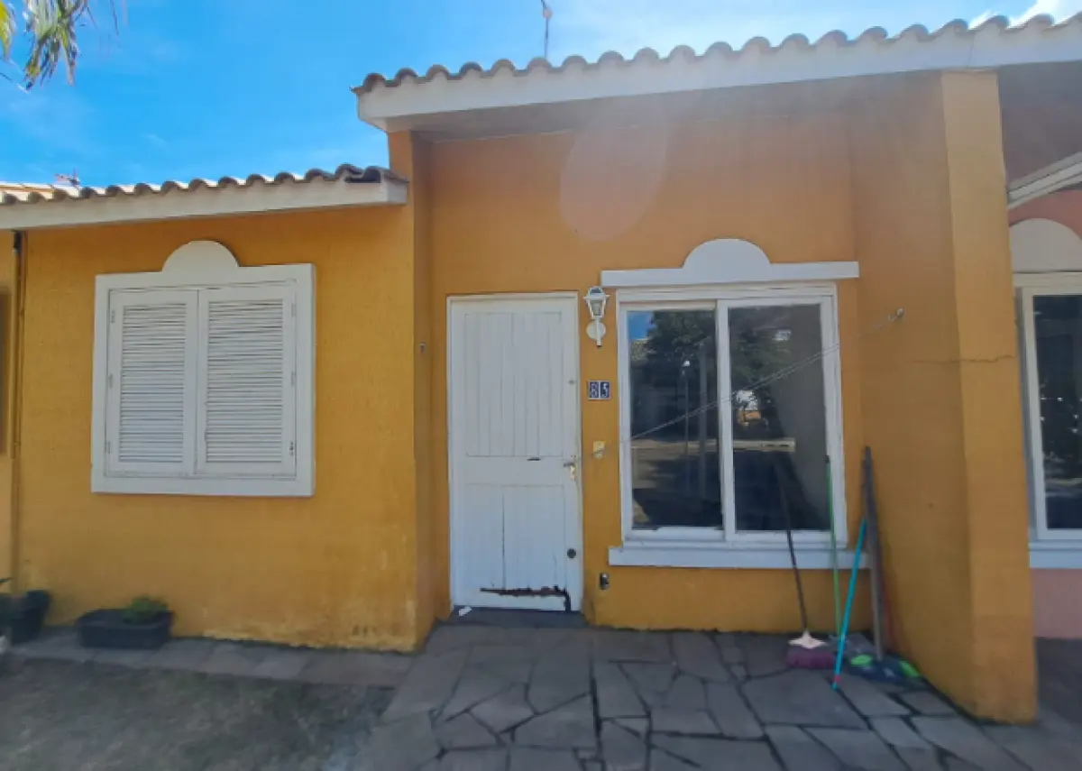 LOTE 000 - A casa nº 85, do Condomínio Horizontal “Jardine Di Verdi”, localizado na Rua Paes Leme, nº 715, Canoas/RS, possuindo a área privativa de 87,75m²