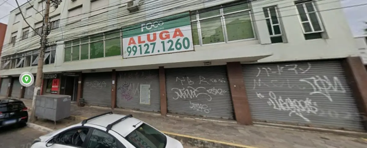 LOTE 000 - A Loja nº 1, com entrada pelo nº 4511 da Avenida Bento Gonçalves, localizada no 1º pavimento ou andar térreo, de frente à esquerda, tendo uma área própria de 1.271,71m2