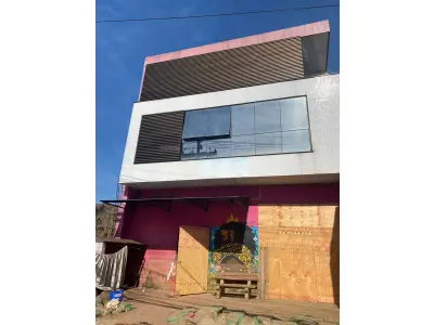 LOTE 000 - O prédio nº 97 da R. Comendador Azevedo, compreendendo casa de alvenaria, suas dependências, benfeitorias, instalações e o respectivo terreno que mede 8m80 de frente à dita rua, por 30m