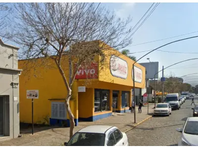 LOTE 002 - GRANDE IMÓVEL EM DOIS IRMÃOS NO CENTRO COM 465M2  E APROX. 445M2 CONSTRUÍDOS - OTIMO PARA LOJA