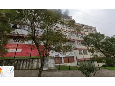 LOTE 000 - 	Um prédio de esquina, situado na Avenida Bento Gonçalves, nº 1820 e 1828, na esquina com a R. Veríssimo Rosa