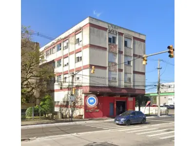 LOTE 000 - 	Um prédio de esquina, situado na Avenida Bento Gonçalves, nº 1820 e 1828, na esquina com a R. Veríssimo Rosa
