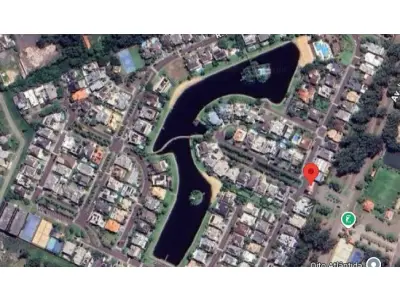 LOTE 000 - O imóvel na Avenida Interbalneários nº 436, lote 1L, situado no Condomínio Horizontal de Lotes Porto Coronado, localizado na Praia de Atlântida, município de Xangri-lá, constituído do lote 1L, da quadra L, com área superficial privativa de 450m2