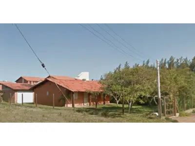 LOTE 000 - O imóvel na Rua Rene nº 101, Praia dos Coqueiros, Xangri-lá, entre as praias Noiva do Mar e Arpoador, constituído do lote nº 27 da quadra 03, com a área de 459,15m2