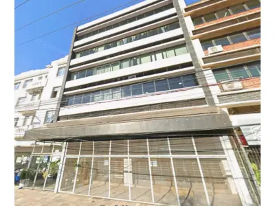 LOTE 039 - O CONJUNTO 303 do Edifício Dom Cláudio, com entrada pelo nº 1130 da avenida Benjamin Constant com área real privativa de 59,16m²