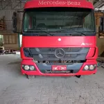LOTE 002 - Lote de veículos englobados (caminhões e kombi)