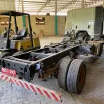 LOTE 002 - Lote de veículos englobados (caminhões e kombi)