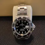 LOTE 001 - ROLEX Automático Submariner 300m ano 2001, com certificado