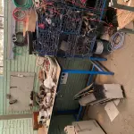 LOTE 455 - Bancada de teste e caixas de metal 