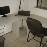 LOTE 004 - cadeira estofada fixa