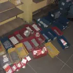 LOTE 057 - Lote com 27 caixas com buxas divesas, saco com buchas, caixa com saco de embalagem 