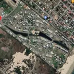 LOTE 002 - Os direitos e ações sobre o terreno urbano, sem benfeitorias, no Cond. Horizontal Ocean Side área real privativa de 480m2