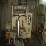 LOTE 003 - empacotadeira automática Indumak com silo pequeno num 1