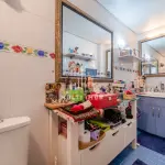 LOTE 000 - O apartamento nº 601 no Ed. Maison Paris, na Rua Pedro Ivo nº 532. O espaço de estacionamento coberto nº 01. O espaço de estacionamento coberto nº 02