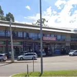 LOTE 002 - Prédio Comercial em alvenaria - shopping de lojas e posto combustivel