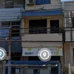 LOTE 000 - O prédio de três pavimentos, em alvenaria, com 224,28m², sob o nº 653 da Rua Coronel Fernando Machado