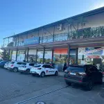 LOTE 002 - Prédio Comercial em alvenaria - shopping de lojas e posto combustivel