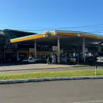 LOTE 002 - Prédio Comercial em alvenaria - shopping de lojas e posto combustivel