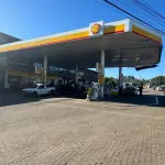 LOTE 002 - Prédio Comercial em alvenaria - shopping de lojas e posto combustivel