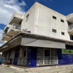 LOTE 001 - Prédio comercial de esquina possuindo 04 pavimentos