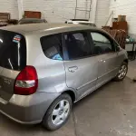 LOTE 000 - Honda/Fit LX, cor dourada, fabricação/modelo 2004/2004