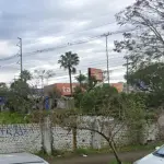 LOTE 000 - Avenida Assis Brasil, nº 4.700 com a área superficial de 5.374,32m² e os direitos de aquisição da proporção de 1/3 (um terço) do terreno na Rua Eduardo Mastalir