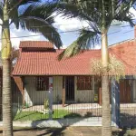LOTE 008 - NOVO HAMBURGO - O terreno com um prédio residencial em alvenaria de padrão simples, sob o n.º 353 da Rua dos Eucaliptos, situado no bairro Ideal