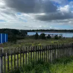 LOTE 002 - Pavilhão industrial na cidade de Alvorada, terreno com a área de 24.284,50m2, constituído dos lotes números 1 ao 8 da Qua-dra A, formada pela Estrada Candido Pinheiro de Barcelos